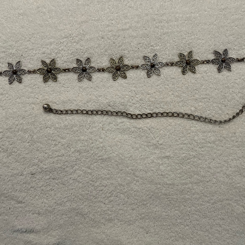 Chicos silver and gold like flower chain link belt.